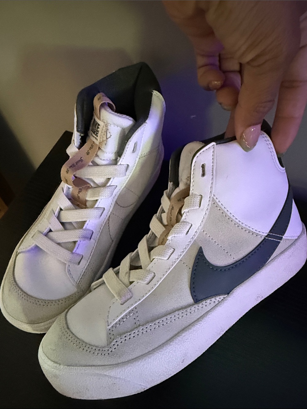 Nike Mid-Top Sneakers in White with Black Swoosh